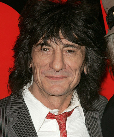 Гитарист Rolling Stones возвращается к жене