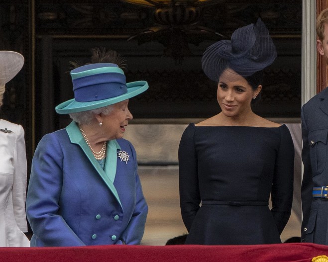 Королева Елизавета II и Меган Маркл