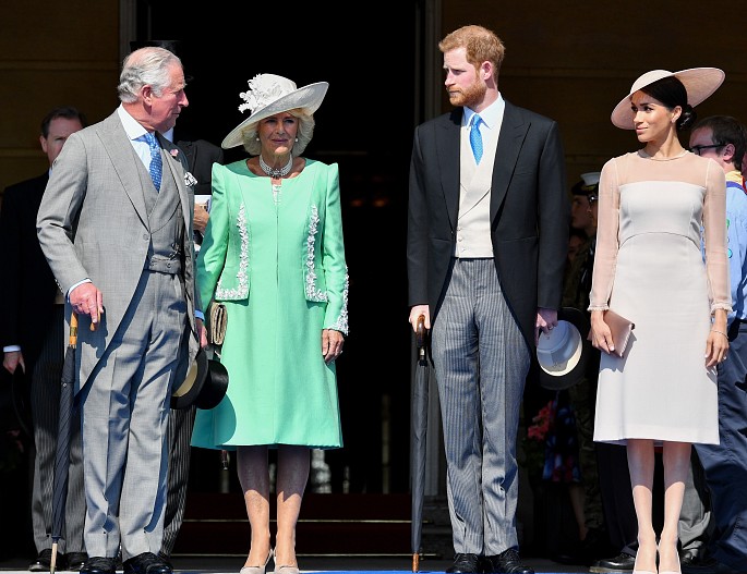 Принц Чарльз и герцогиня Камилла, принц Гарри и Меган Маркл