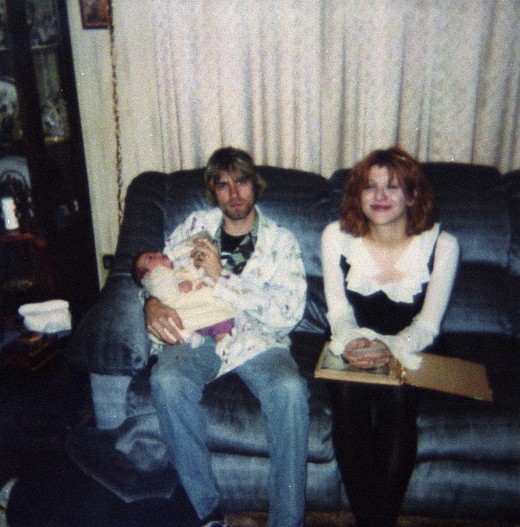 Курт Кобейн и Кортни Лав со своей дочерью