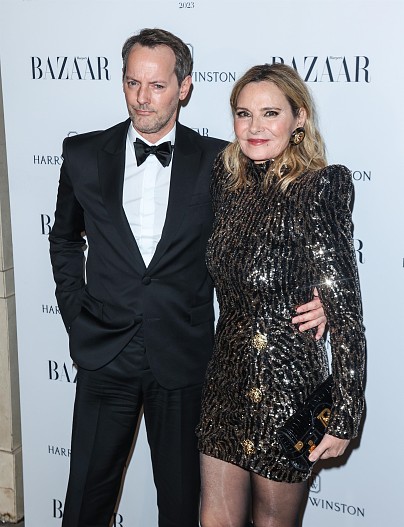 Рассел Томас и Ким Кэттролл