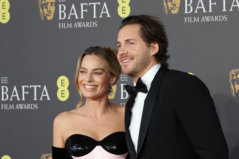 Марго Робби и Том Акерли