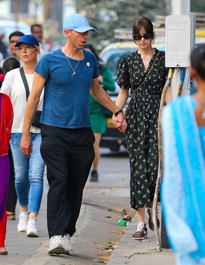 Крис Мартин и Дакота Джонсон