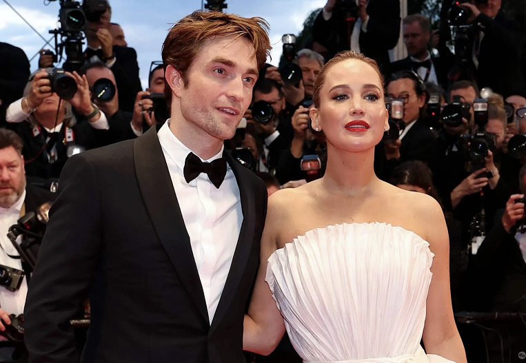 Роберт Паттинсон и Дженнифер Лоуренс на премьере картины в Каннах