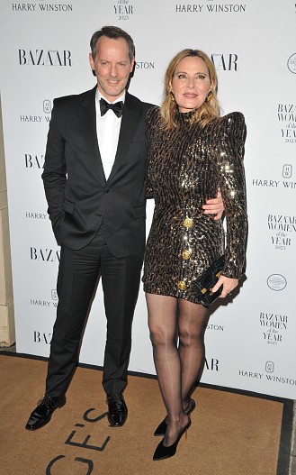 Рассел Томас и Ким Кэтролл